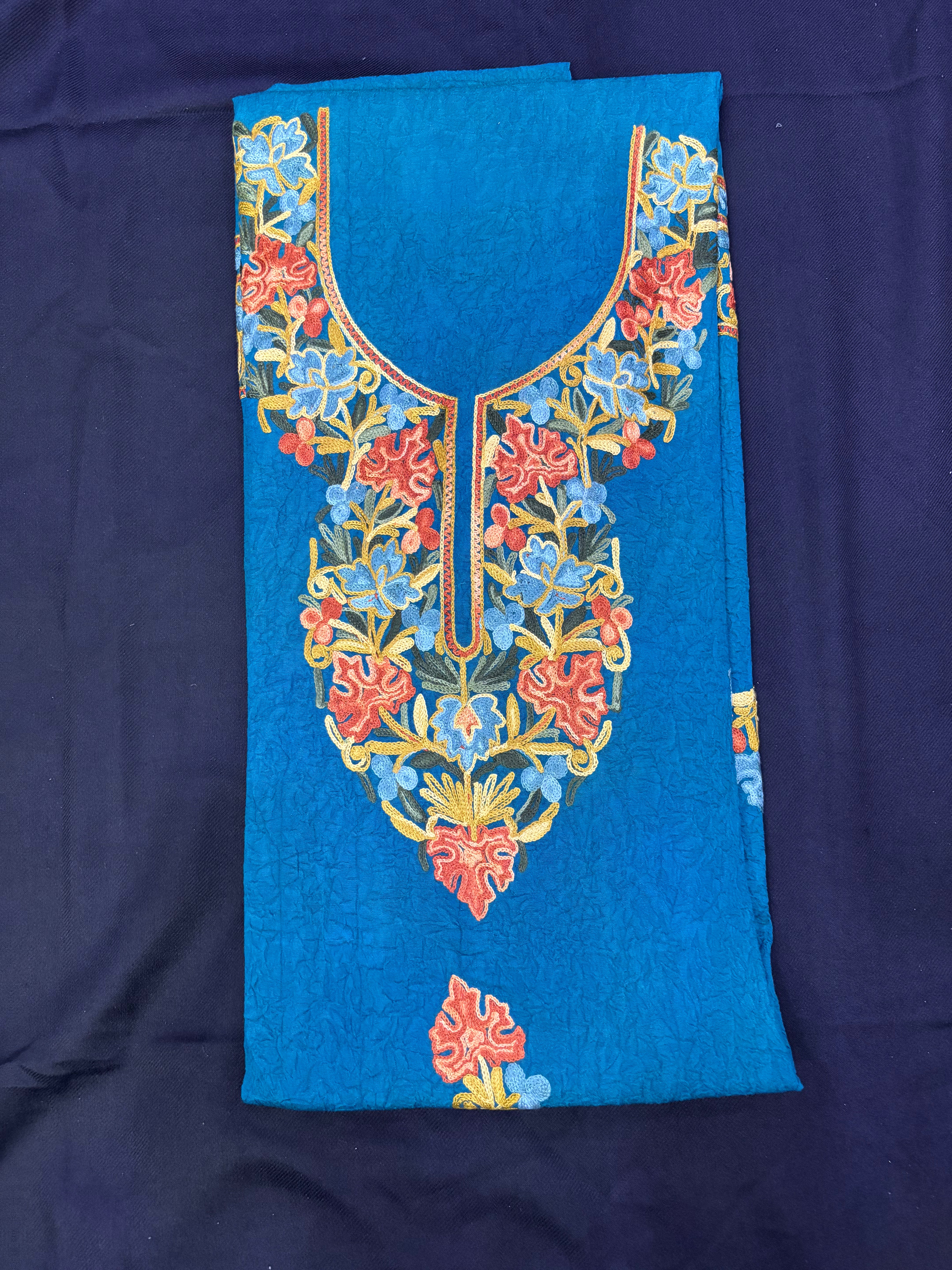 Peacock colored textured cotton two pc set with floral embroidery