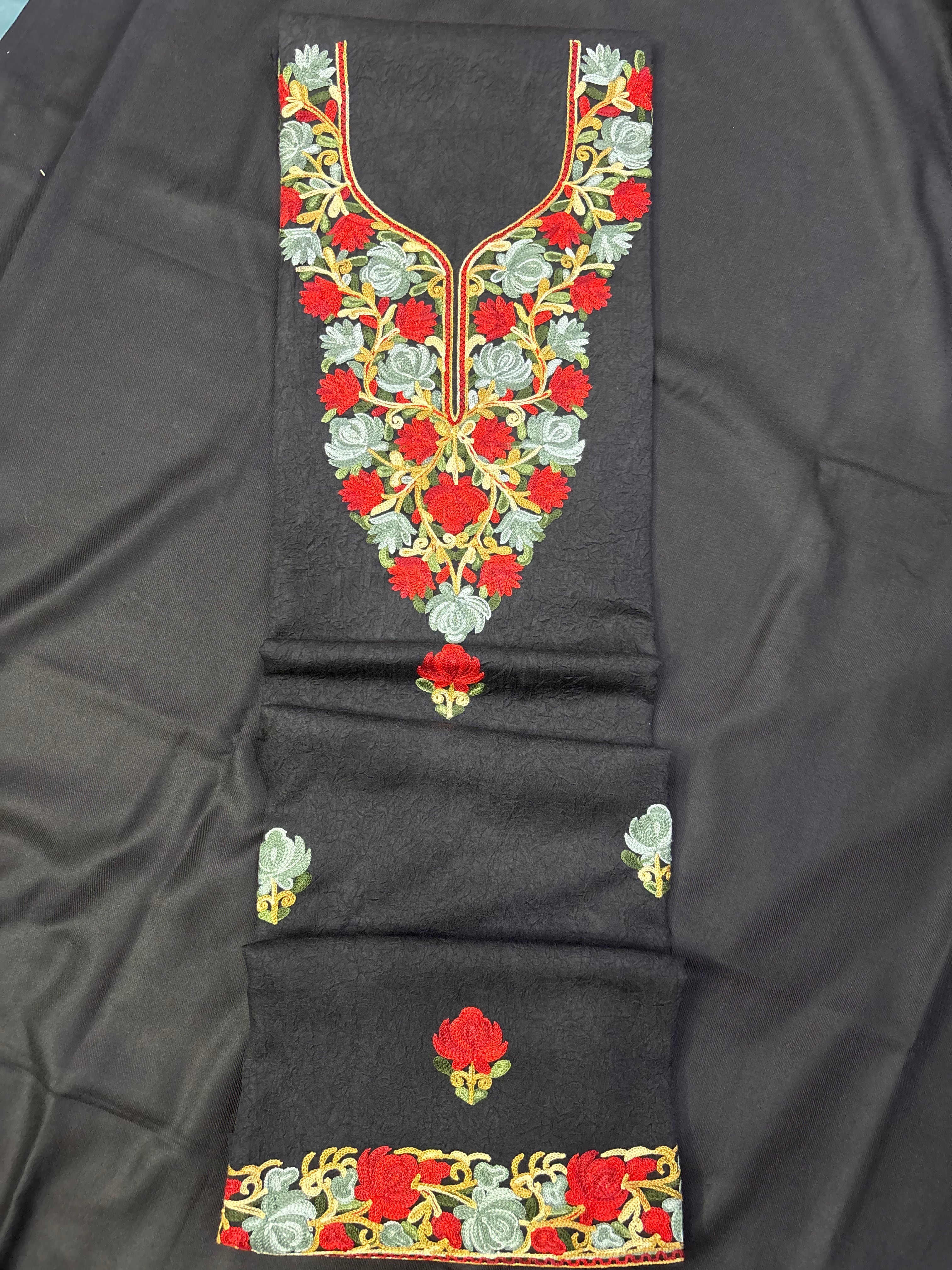 Black colored textured cotton two pc set with floral embroidery